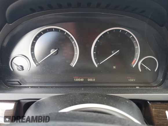 2012 BMW 7 Series with VIN WBAKX6C58CC197207, listed as a Copart auction lot 84153784 with 130,049 mi miles and Salvage title. Bid and sale history available at DreamBid. Image 9.