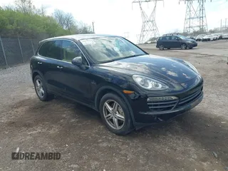 2011 Porsche Cayenne S Hybrid with VIN WP1AE2A27BLA91799, listed as a IAAI auction lot 42035613 with 131,480 mi miles. Bid and sale history available at carsss.com. Image 1.