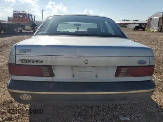 1989 Ford Taurus GL with VIN 1FABP52U3KG163808, listed as a Copart auction lot 68191314 with 5,676 mi miles and Clean Title. Bid and sale history available at carsss.com. Image 6.