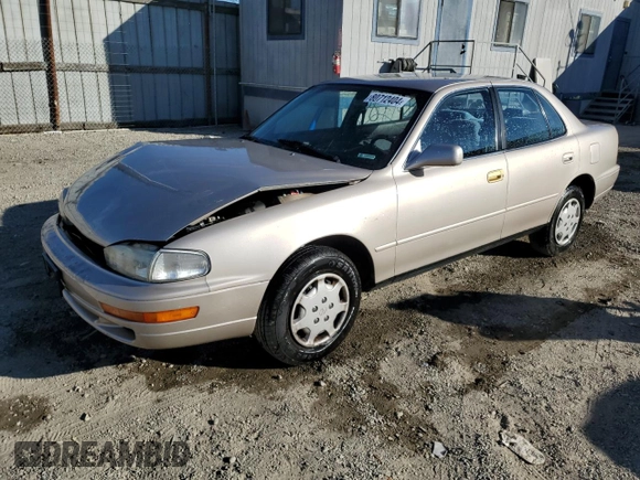 1992 Toyota Camry LE with VIN 4T1SK12E6NU059325, listed as a Copart auction lot 80712404 with 163,685 mi miles and Salvage Title. Bid and sale history available at carsss.com. Image 1.