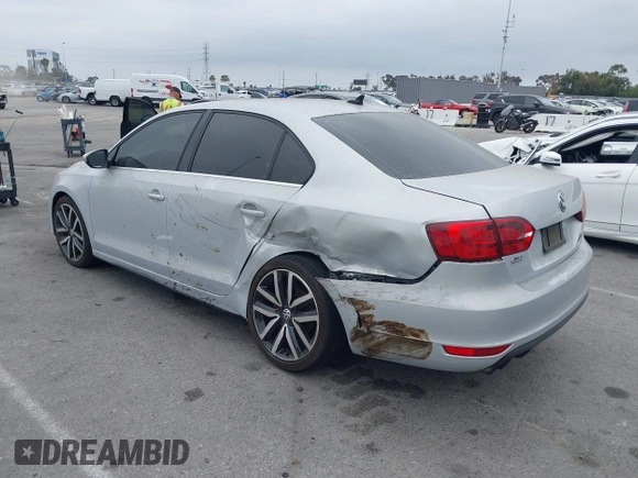 2012 Volkswagen Jetta GLI Autobahn with VIN 3VW4A7AJ1CM450205, listed as a IAAI auction lot 42421504 with 130,602 mi miles and . Bid and sale history available at DreamBid. Image 3.