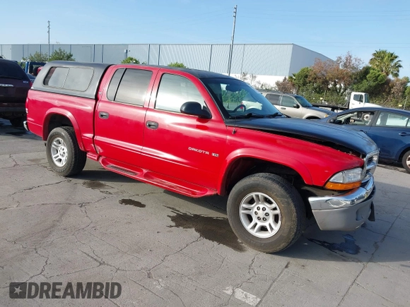 2001 Dodge Dakota Sport with VIN 1B7GG2AN51S148828, listed as a IAAI auction lot 42095653 with 232,995 mi miles and . Bid and sale history available at carsss.com. Image 1.
