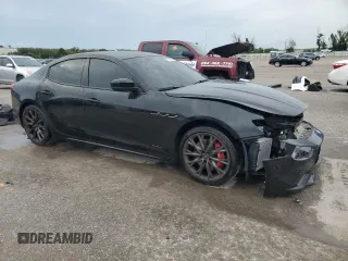 2021 Maserati Ghibli with VIN ZAM57XSS4M1368749, listed as a Copart auction lot 70784004 with 43,930 mi miles and Salvage Title. Bid and sale history available at carsss.com. Image 4.