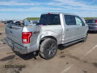 2015 Ford F-150 XLT with VIN 1FTEW1EG3FKD37310, listed as a IAAI auction lot 41681029 with 145,069 mi miles. Bid and sale history available at carsss.com. Image 4.