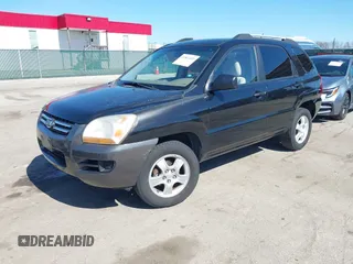 2007 Kia Sportage LX with VIN KNDJF724877313178, listed as a IAAI auction lot 41863492 with 199,138 mi miles. Bid and sale history available at carsss.com. Image 18.