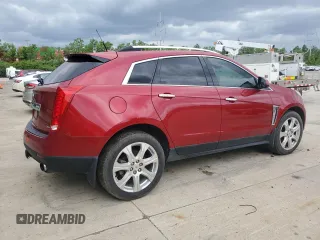 2014 Cadillac SRX Performance Collection z VIN 3GYFNFE38ES560229, wystawiony jako Copart lot #58025485 z przebiegiem 170 344 mil mil oraz Tytuł czysty. Historia ofert i sprzedaży dostępna na DreamBid. Obrazek 3.