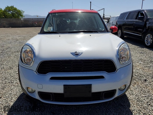 2013 MINI Countryman S ALL4 z VIN WMWZC5C56DWM16296, wystawiony jako Copart lot #56985615 z przebiegiem 63 858 mil mil oraz Szkoda całkowita • Salvage title. Historia ofert i sprzedaży dostępna na DreamBid. Obrazek 5.