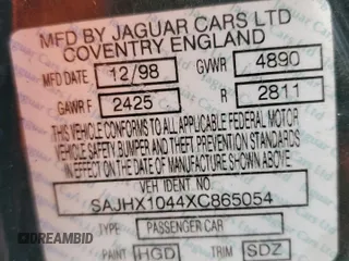 1999 Jaguar XJ with VIN SAJHX1044XC865054, listed as a Copart auction lot 57825325 with 71,145 mi miles and Clean title. Bid and sale history available at DreamBid. Image 12.
