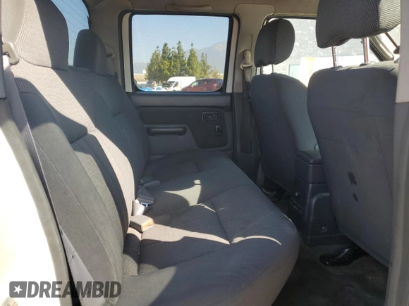 2004 Nissan Frontier XE with VIN 1N6ED29X94C423389, listed as a Copart auction lot 57357255 with 195,700 mi miles and Salvage title. Bid and sale history available at DreamBid. Image 10.