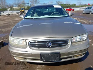 1997 Buick Regal LS with VIN 2G4WB52K9V1435882, listed as a IAAI auction lot 41974673 with 64,402 mi miles. Bid and sale history available at carsss.com. Image 6.