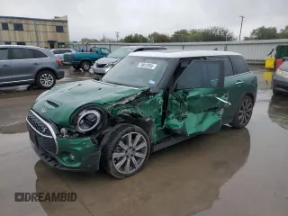 2023 MINI Clubman Cooper S with VIN WMWLV7C02P2S69664, listed as a Copart auction lot 79812554 with 9,819 mi miles and Salvage Title. Bid and sale history available at carsss.com. Image 1.