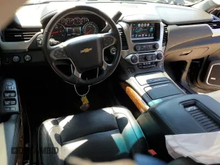 2018 Chevrolet Tahoe Premier with VIN 1GNSKCKC1JR133625, listed as a Copart auction lot 54900974 with 130,921 mi miles and Salvage title. Bid and sale history available at DreamBid. Image 8.