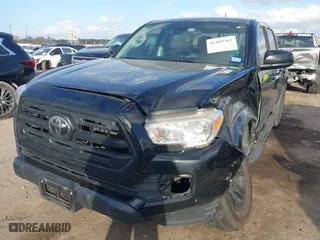 2019 Toyota Tacoma 2WD SR with VIN 5TFAX5GN2KX139779, listed as a IAAI auction lot 41489762 with 90,909 mi miles. Bid and sale history available at carsss.com. Image 17.