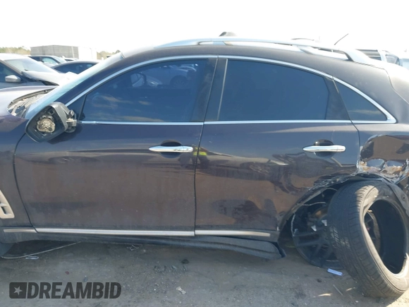 2011 Infiniti FX35 with VIN JN8AS1MW2BM140442, listed as a IAAI auction lot 41746340 with 207,569 mi miles. Bid and sale history available at carsss.com. Image 14.