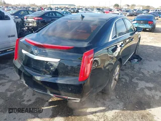 2013 Cadillac XTS Luxury with VIN 2G61P5S34D9237884, listed as a IAAI auction lot 41336761 with 156,830 mi miles and . Bid and sale history available at DreamBid. Image 4.