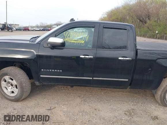 2014 Chevrolet Silverado 1500 LTZ with VIN 1GCVKSEC0EZ390082, listed as a IAAI auction lot 42030144 with 161,353 mi miles and . Bid and sale history available at DreamBid. Image 14.