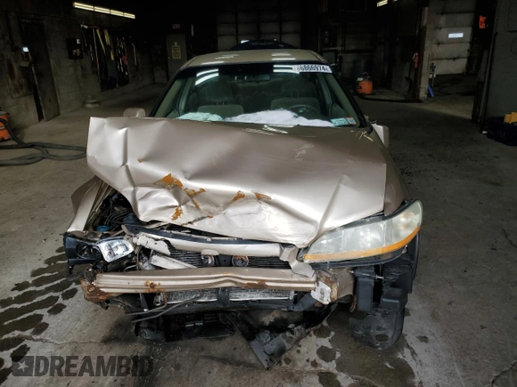 2002 Honda Accord LX z VIN 1HGCG16412A058092, wystawiony jako Copart lot #86866974 z przebiegiem Nie podano mil oraz Szkoda całkowita • Salvage title. Historia ofert i sprzedaży dostępna na DreamBid. Obrazek 5.