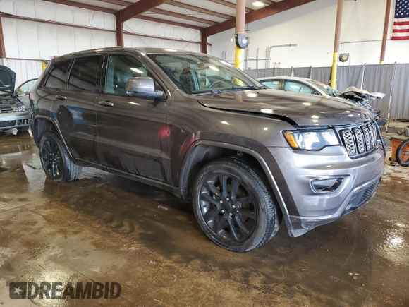 2020 Jeep Grand Cherokee Laredo E with VIN 1C4RJFAG4LC416171, listed as a Copart auction lot 56298275 with 59,951 mi miles and Salvage title. Bid and sale history available at DreamBid. Image 4.