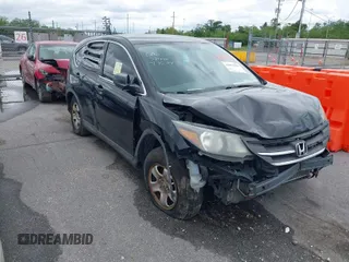 2014 Honda CR-V LX with VIN 3CZRM3H32EG702751, listed as a IAAI auction lot 41985534 with 219,675 mi miles. Bid and sale history available at carsss.com. Image 1.