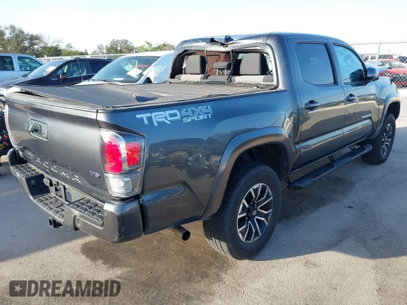 2023 Toyota Tacoma 4WD SR with VIN 3TMCZ5AN7PM587833, listed as a IAAI auction lot 41853887 with 16,532 mi miles. Bid and sale history available at carsss.com. Image 4.