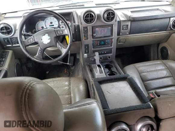 2004 Hummer H2 z VIN 5GRGN23U94H109105, wystawiony jako Copart lot #60548255 z przebiegiem 218 770 mil mil oraz Czysty tytuł • Clean title. Historia ofert i sprzedaży dostępna na DreamBid. Obrazek 8.