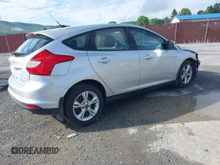 2012 Ford Focus SE z VIN 1FAHP3K27CL241013, wystawiony jako IAAI lot #42198812 z przebiegiem 121 888 mil mil oraz . Historia ofert i sprzedaży dostępna na DreamBid. Obrazek 4.