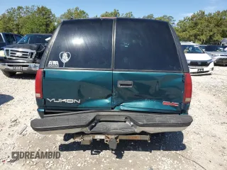 1999 GMC Yukon with VIN 1GKEC13R8XJ792078, listed as a Copart auction lot 50903294 with 232,672 mi miles and Salvage Title. Bid and sale history available at carsss.com. Image 6.