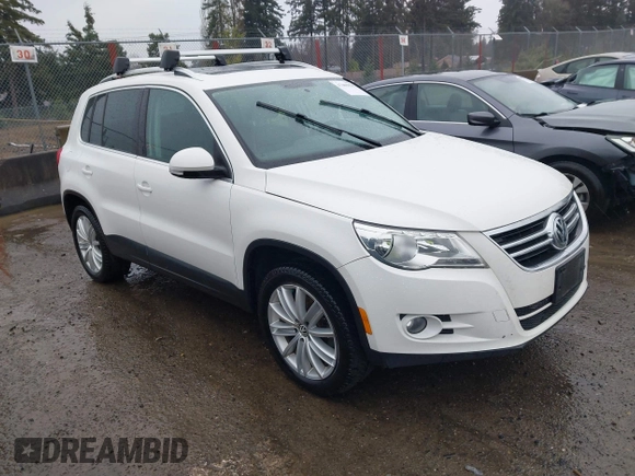 2011 Volkswagen Tiguan SE with VIN WVGBV7AXXBW546640, listed as a IAAI auction lot 41665036 with 106,071 mi miles and . Bid and sale history available at DreamBid. Image 1.