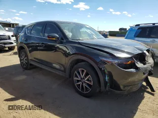 2018 Mazda CX-5 Grand Touring with VIN JM3KFBDMXJ0319026, listed as a Copart auction lot 50721385 with 48,292 mi miles and Salvage Title. Bid and sale history available at DreamBid. Image 4.