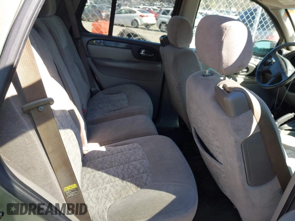 2003 GMC Envoy SLT with VIN 1GKDS13S432373988, listed as a IAAI auction lot 41840744 with 221,306 mi miles. Bid and sale history available at carsss.com. Image 8.