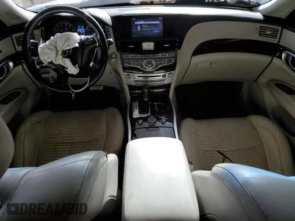 2011 Infiniti M with VIN JN1BY1APXBM324638, listed as a Copart auction lot 51014985 with 194,447 mi miles and Salvage title. Bid and sale history available at DreamBid. Image 8.