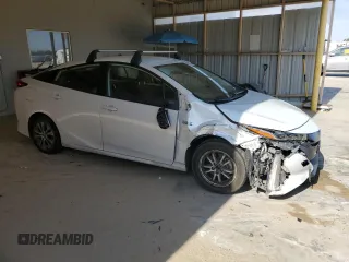 2021 Toyota Prius LE с VIN JTDKAMFP5M3186379, выставлен на аукционе Copart как лот 58527115 с пробегом 93 203 миль миль и Списание • Salvage title. История ставок и продаж доступна на DreamBid. Изображение 4.