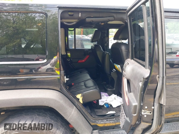 2014 Jeep Wrangler Unlimited Sahara с VIN 1C4BJWEG0EL248401, выставлен на аукционе IAAI как лот 42306970 с пробегом 134 904 миль миль и . История ставок и продаж доступна на DreamBid. Изображение 8.
