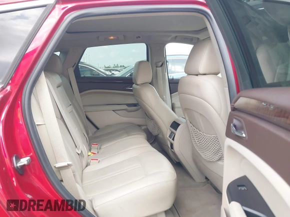 2014 Cadillac SRX Luxury Collection z VIN 3GYFNBE39ES576335, wystawiony jako IAAI lot #42093334 z przebiegiem 69 804 mil mil oraz . Historia ofert i sprzedaży dostępna na DreamBid. Obrazek 8.
