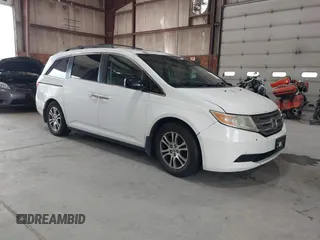 2012 Honda Odyssey EX-L with VIN 5FNRL5H65CB017743, listed as a IAAI auction lot 42779867 with 305,844 mi miles and . Bid and sale history available at DreamBid. Image 1.