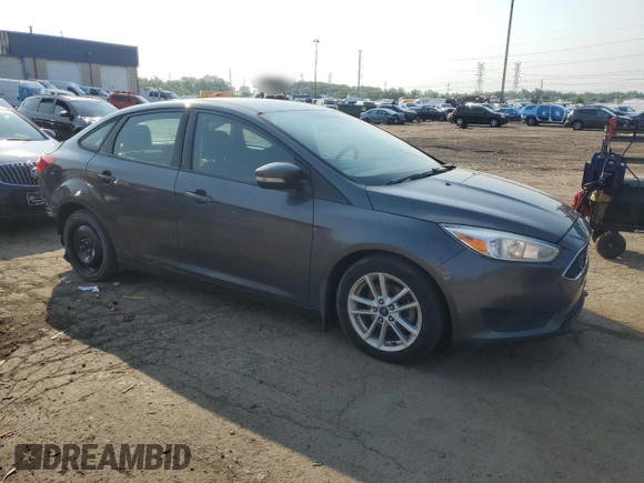 2015 Ford Focus SE with VIN 1FADP3F22FL289838, listed as a Copart auction lot 60606615 with 157,870 mi miles and Clean title. Bid and sale history available at DreamBid. Image 4.