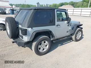 2012 Jeep Wrangler Sport z VIN 1C4AJWAG9CL255278, wystawiony jako IAAI lot #42469091 z przebiegiem 140 480 mil mil oraz . Historia ofert i sprzedaży dostępna na DreamBid. Obrazek 4.