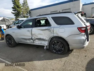 2023 Dodge Durango R/T Plus z VIN 1C4SDHCTXPC685988, wystawiony jako Copart lot #87110694 z przebiegiem 15 216 mil mil oraz Szkoda całkowita • Salvage title. Historia ofert i sprzedaży dostępna na DreamBid. Obrazek 2.