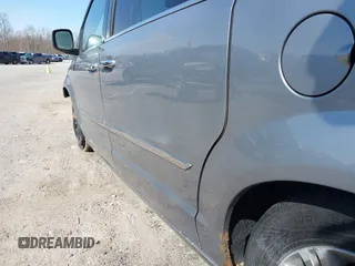 2013 Chrysler Town & Country Touring L with VIN 2C4RC1CG6DR660858, listed as a IAAI auction lot 41970976 with 140,299 mi miles and . Bid and sale history available at DreamBid. Image 21.