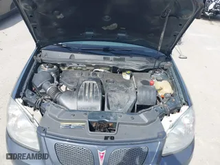 2009 Pontiac G5 with VIN 1G2AS18H897149649, listed as a IAAI auction lot 41917410 with 113,565 mi miles. Bid and sale history available at carsss.com. Image 10.