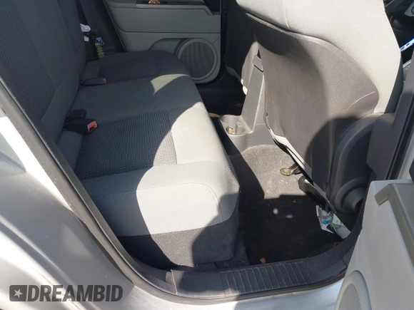 2007 Jeep Compass Sport with VIN 1J8FT47W57D185807, listed as a IAAI auction lot 41700283 with 194,339 mi miles. Bid and sale history available at carsss.com. Image 8.