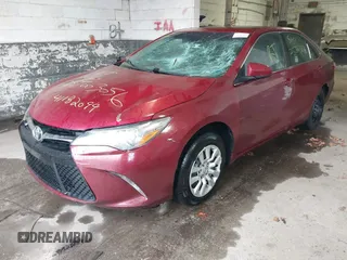 2015 Toyota Camry XLE with VIN 4T1BF1FK8FU932854, listed as a IAAI auction lot 41872099 with Not Provided miles and . Bid and sale history available at DreamBid. Image 16.