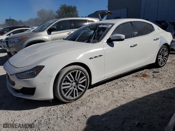 2018 Maserati Ghibli with VIN ZAM57XSA4J1295191, listed as a Copart auction lot 82411644 with NaN miles and Salvage Title. Bid and sale history available at carsss.com. Image 1.