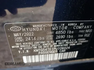 2023 Genesis G70 3.3T with VIN KMTG54TE1PU106024, listed as a Copart auction lot 70501604 with 24,470 mi miles and Salvage Title. Bid and sale history available at DreamBid. Image 12.