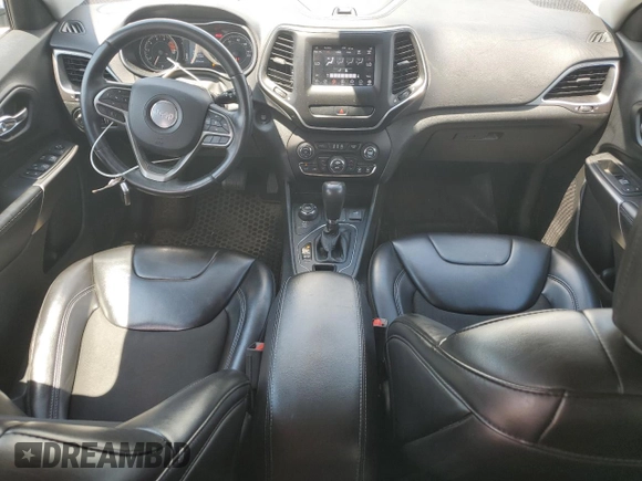 2019 Jeep Cherokee Latitude Plus with VIN 1C4PJMLX3KD251974, listed as a Copart auction lot 63378625 with 59,144 mi miles and Salvage title. Bid and sale history available at DreamBid. Image 8.