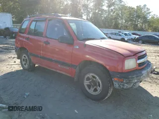 2002 Chevrolet Tracker z VIN 2CNBE13C126918772, wystawiony jako Copart lot #42343685 z przebiegiem Nie podano mil oraz Szkoda całkowita • Salvage title. Historia ofert i sprzedaży dostępna na DreamBid. Obrazek 4.