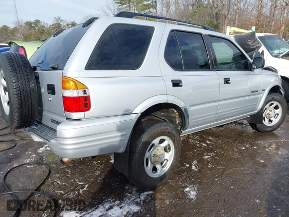 2001 Honda Passport LX z VIN 4S6CK58W014401073, wystawiony jako IAAI lot #41380551 z przebiegiem 259 878 mil mil oraz . Historia ofert i sprzedaży dostępna na DreamBid. Obrazek 4.