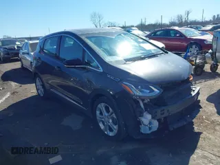 2019 Chevrolet Bolt EV LT z VIN 1G1FY6S03K4115862, wystawiony jako IAAI lot #41621140 z przebiegiem 44 840 mil mil oraz . Historia ofert i sprzedaży dostępna na DreamBid. Obrazek 1.