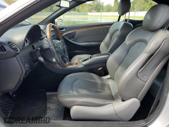 2009 Mercedes-Benz CLK-Class 3.5L with VIN WDBTK56F69T105071, listed as a Copart auction lot 77170654 with 70,688 mi miles and Salvage Title. Bid and sale history available at carsss.com. Image 7.