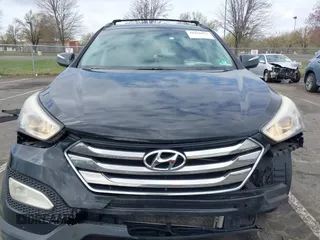 2014 Hyundai Santa Fe z VIN 5XYZUDLBXEG162476, wystawiony jako IAAI lot #41910671 z przebiegiem 146 607 mil mil oraz . Historia ofert i sprzedaży dostępna na DreamBid. Obrazek 12.